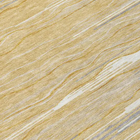 8' Gold Gray And Ivory Round Striped Washable Indoor Outdoor Area Rug Photo 7