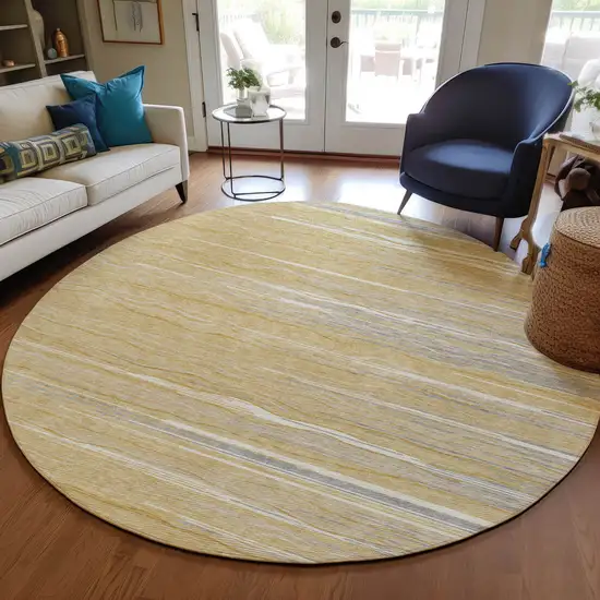 8' Gold Gray And Ivory Round Striped Washable Indoor Outdoor Area Rug Photo 6