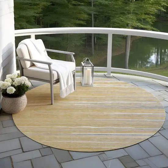 8' Gold Gray And Ivory Round Striped Washable Indoor Outdoor Area Rug Photo 5