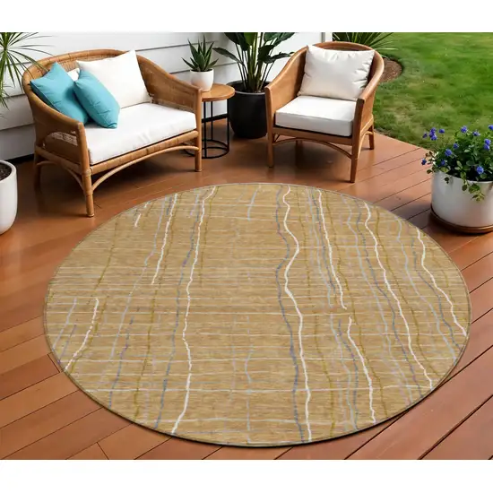 8' Gold Gray And Ivory Round Striped Washable Indoor Outdoor Area Rug Photo 1