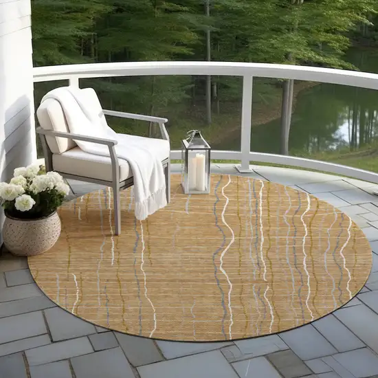 8' Gold Gray And Ivory Round Striped Washable Indoor Outdoor Area Rug Photo 6