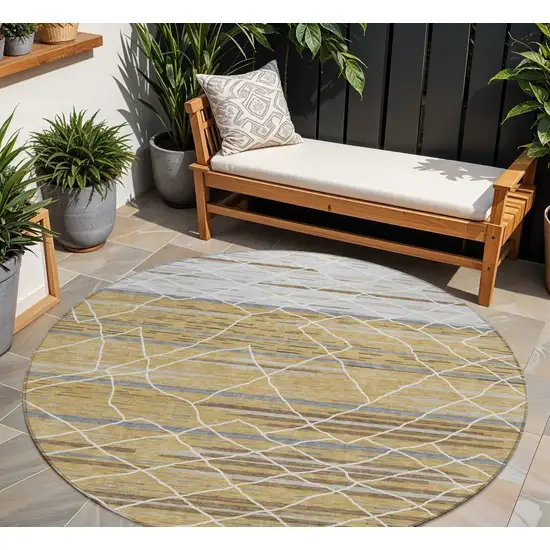 8' Gold Gray And Ivory Round Striped Washable Indoor Outdoor Area Rug Photo 1