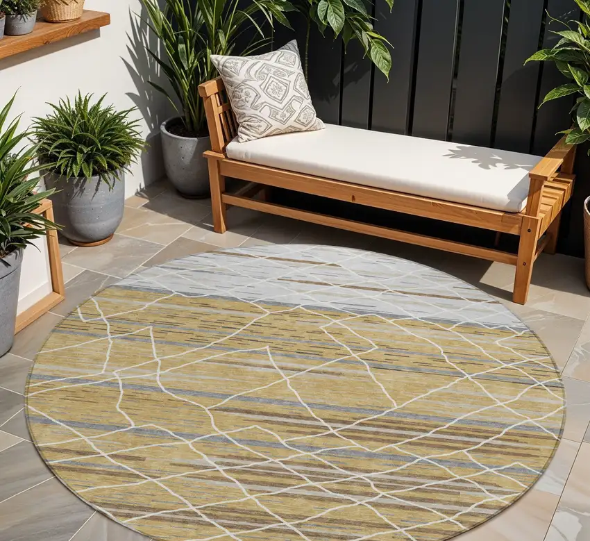 8' Gold Gray And Ivory Round Striped Washable Indoor Outdoor Area Rug Photo 1