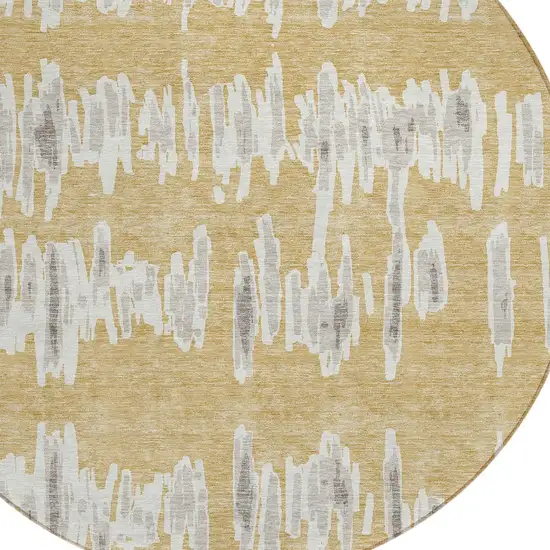 8' Gold Gray And Ivory Round Striped Washable Indoor Outdoor Area Rug Photo 5