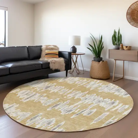 8' Gold Gray And Ivory Round Striped Washable Indoor Outdoor Area Rug Photo 8