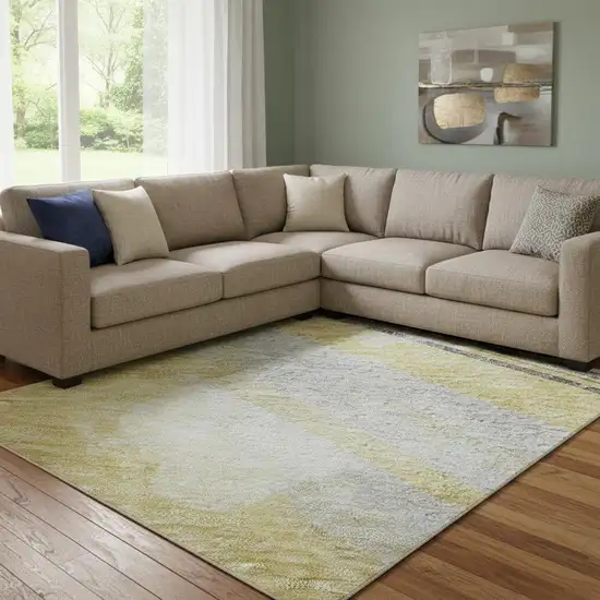 8' Gold Gray And Ivory Striped Washable Area Rug With UV Protection Photo 2