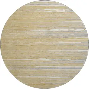 Photo of 8' Gold Gray And Ivory Striped Washable Round Rug With UV Protection