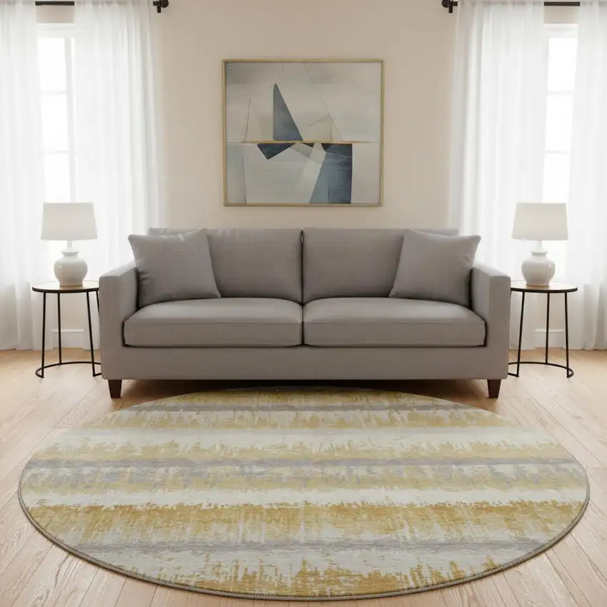 8' Gold Gray And Ivory Striped Washable Round Rug With UV Protection Photo 2