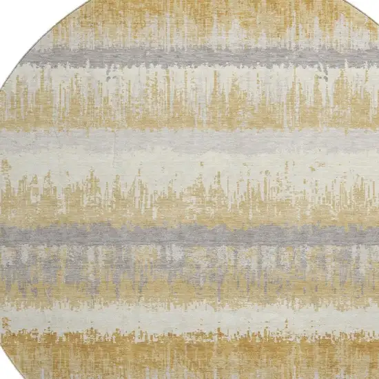 8' Gold Gray And Ivory Striped Washable Round Rug With UV Protection Photo 2