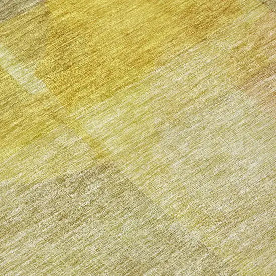 8' Gold Green And Brown Round Abstract Washable Indoor Outdoor Area Rug Photo 9