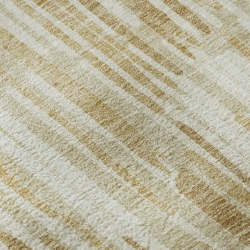 8' Gold Ivory And Beige Abstract Washable Round Rug With UV Protection Photo 9