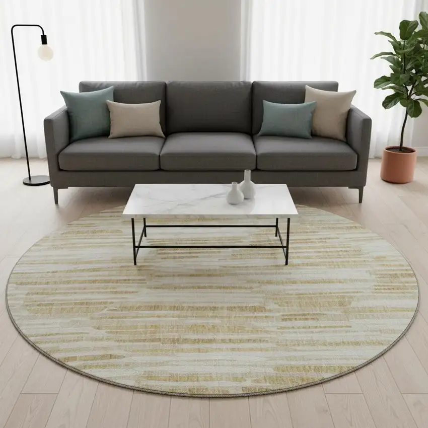 8' Gold Ivory And Beige Abstract Washable Round Rug With UV Protection Photo 2