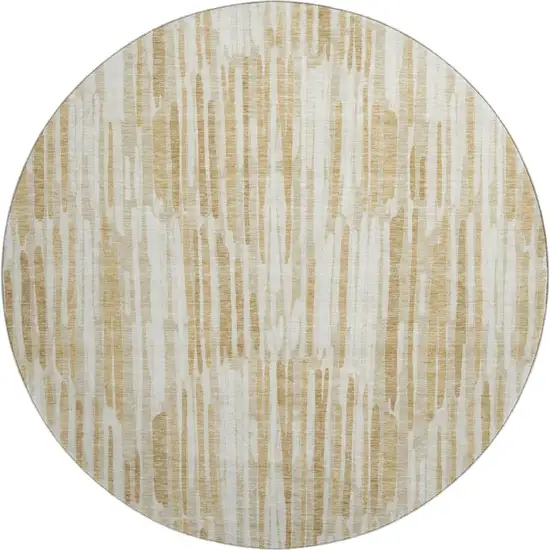 8' Gold Ivory And Beige Abstract Washable Round Rug With UV Protection Photo 1