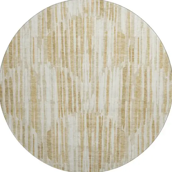 8' Gold Ivory And Beige Abstract Washable Round Rug With UV Protection Photo 4