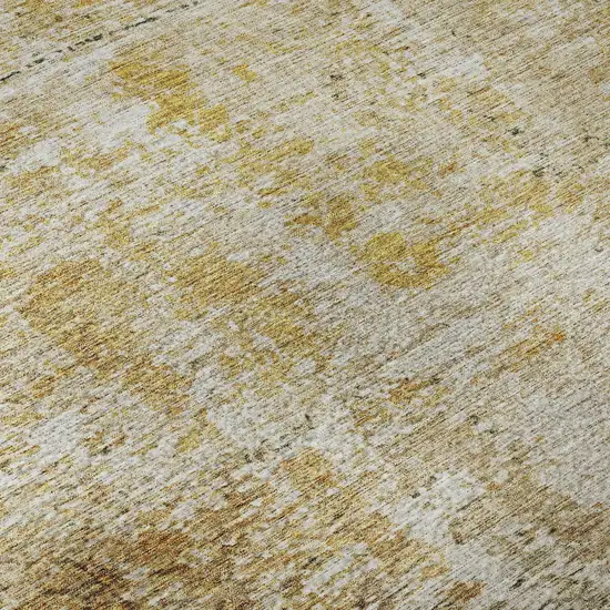 8' Gold Ivory And Beige Geometric Washable Round Rug With UV Protection Photo 9