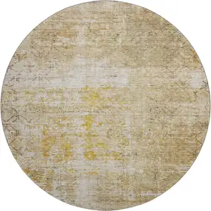 Photo of 8' Gold Ivory And Beige Geometric Washable Round Rug With UV Protection