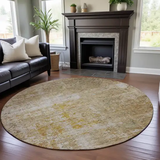 8' Gold Ivory And Beige Geometric Washable Round Rug With UV Protection Photo 4
