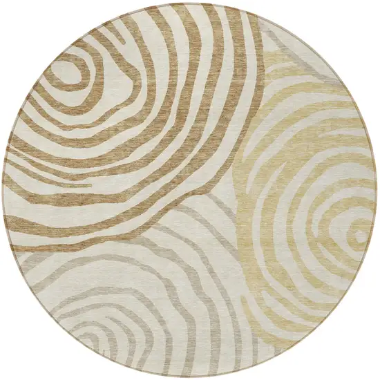 8' Gold Ivory And Beige Round Abstract Washable Indoor Outdoor Area Rug Photo 4