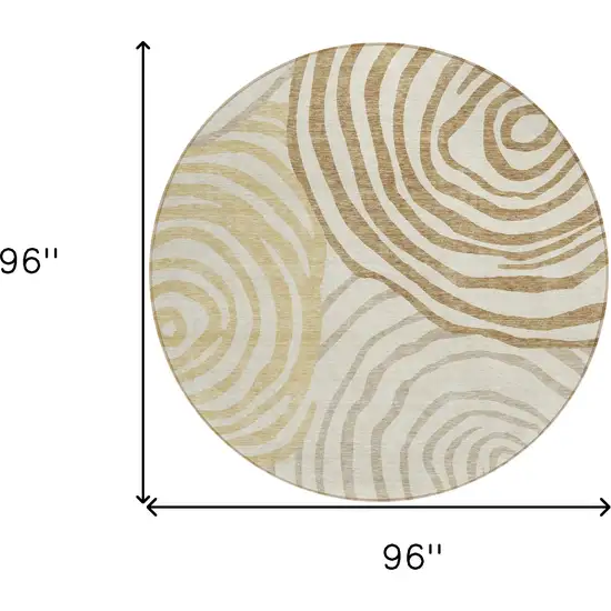 8' Gold Ivory And Beige Round Abstract Washable Indoor Outdoor Area Rug Photo 7