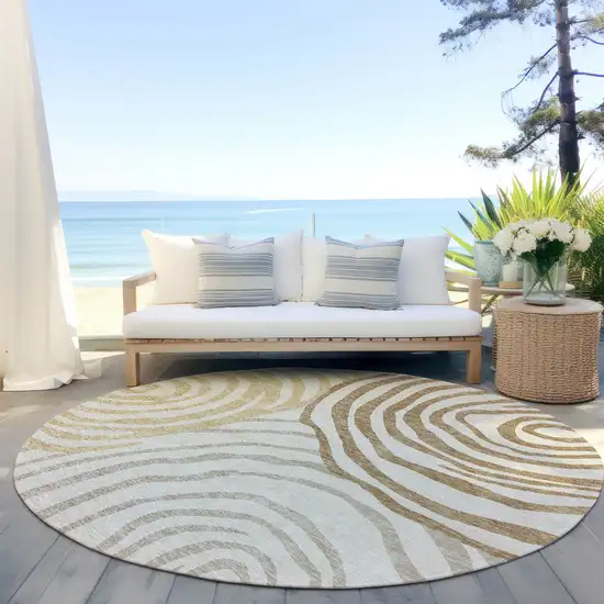 8' Gold Ivory And Beige Round Abstract Washable Indoor Outdoor Area Rug Photo 5