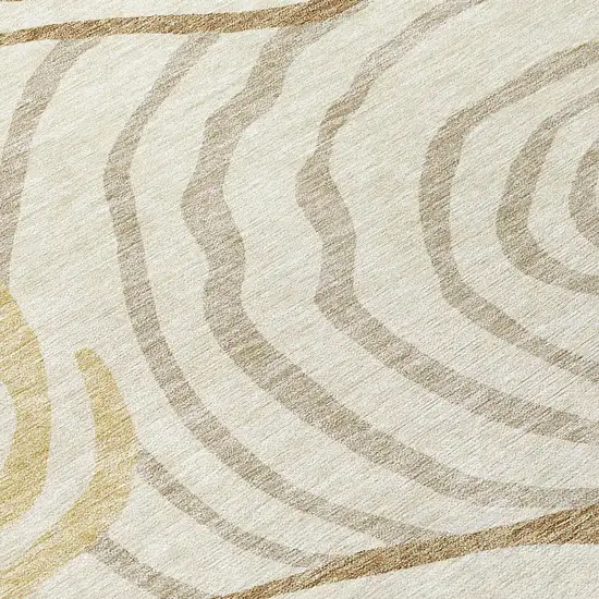 8' Gold Ivory And Beige Round Abstract Washable Indoor Outdoor Area Rug Photo 8