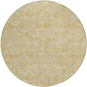 Photo of 8' Gold Ivory And Beige Round Geometric Washable Indoor Outdoor Area Rug