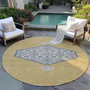 Photo of 8' Gold Ivory And Beige Round Oriental Washable Indoor Outdoor Area Rug