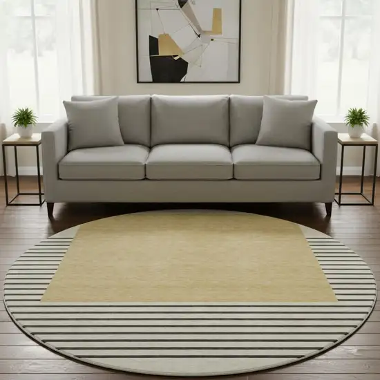 8' Gold Ivory And Black Striped Washable Round Rug With UV Protection Photo 2