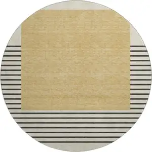 Photo of 8' Gold Ivory And Black Striped Washable Round Rug With UV Protection