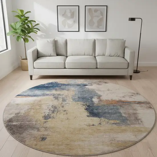 8' Gold Ivory And Blue Abstract Washable Round Rug With UV Protection Photo 2