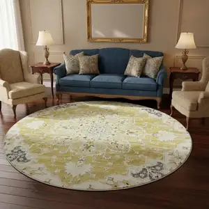 Photo of 8' Gold Ivory And Blue Floral Medallion Washable Round Rug With UV Protection