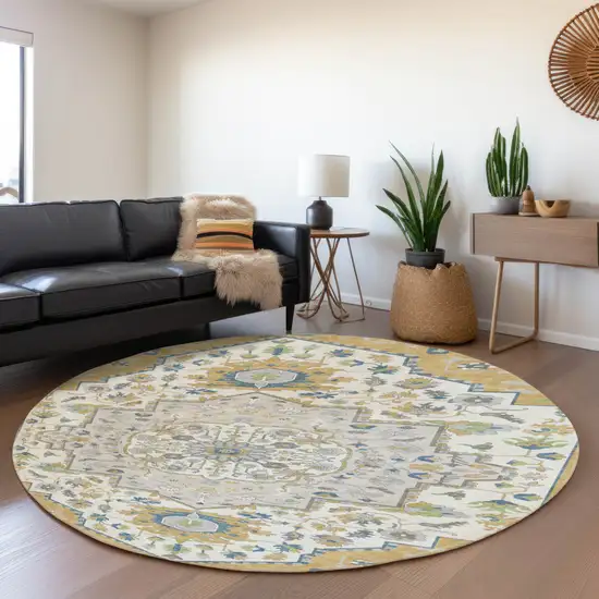 8' Gold Ivory And Blue Oriental Washable Round Rug With UV Protection Photo 4