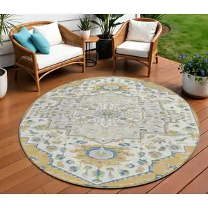 Photo of 8' Gold Ivory And Blue Round Oriental Washable Indoor Outdoor Area Rug