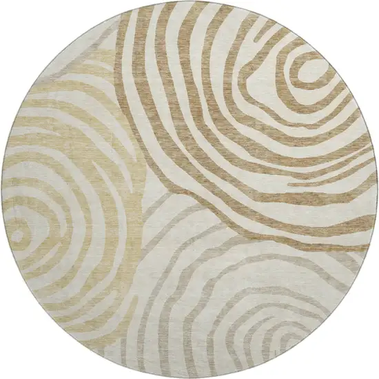 8' Gold Ivory And Brown Abstract Washable Round Rug With UV Protection Photo 1