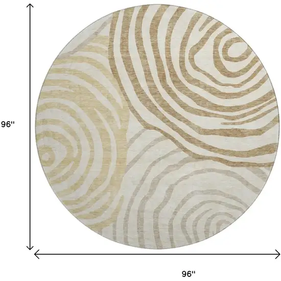 8' Gold Ivory And Brown Abstract Washable Round Rug With UV Protection Photo 9