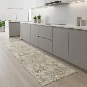 Photo of 8' Gold Ivory And Brown Abstract Washable Runner Rug