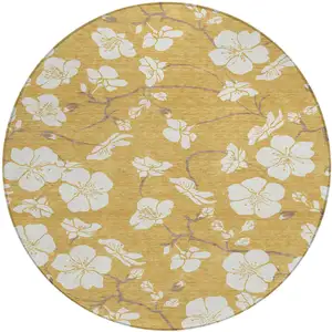 Photo of 8' Gold Ivory And Brown Round Floral Washable Indoor Outdoor Area Rug