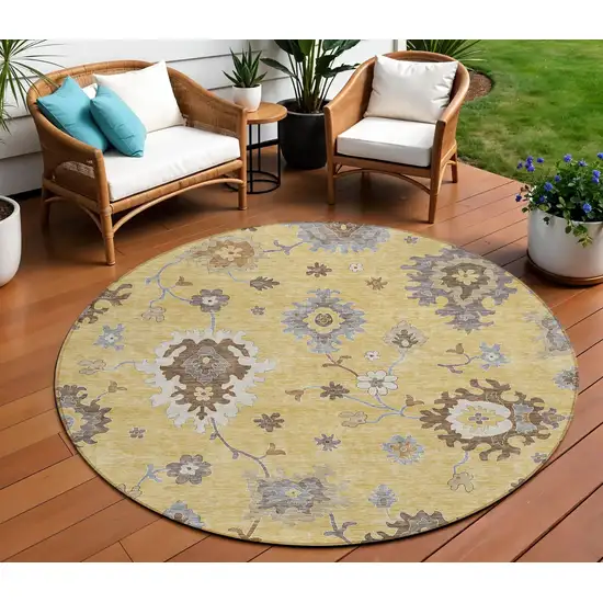 8' Gold Ivory And Brown Round Floral Washable Indoor Outdoor Area Rug Photo 1