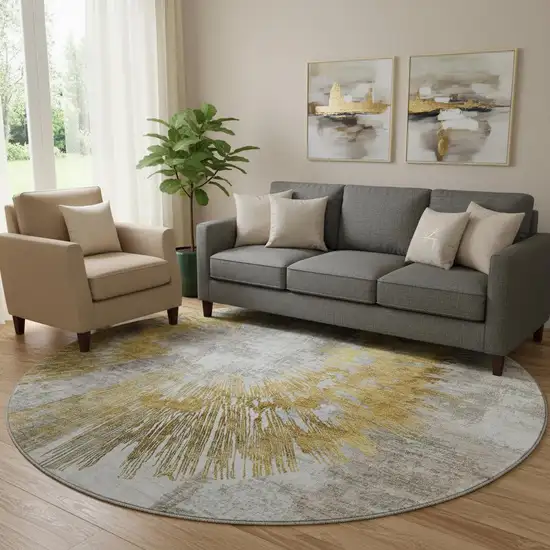 8' Gold Ivory And Gray Abstract Washable Round Rug With UV Protection Photo 1