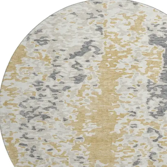 8' Gold Ivory And Gray Abstract Washable Round Rug With UV Protection Photo 2