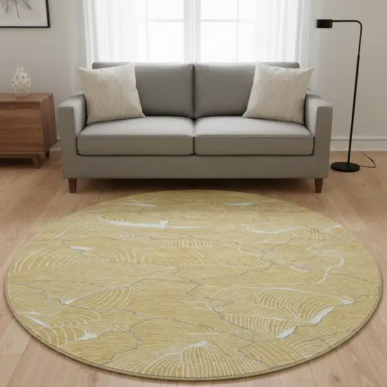 8' Gold Ivory And Gray Abstract Washable Round Rug With UV Protection Photo 2