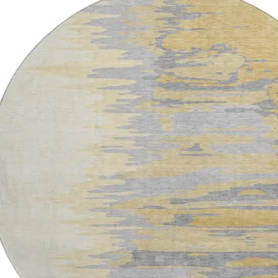 8' Gold Ivory And Gray Abstract Washable Round Rug With UV Protection Photo 2