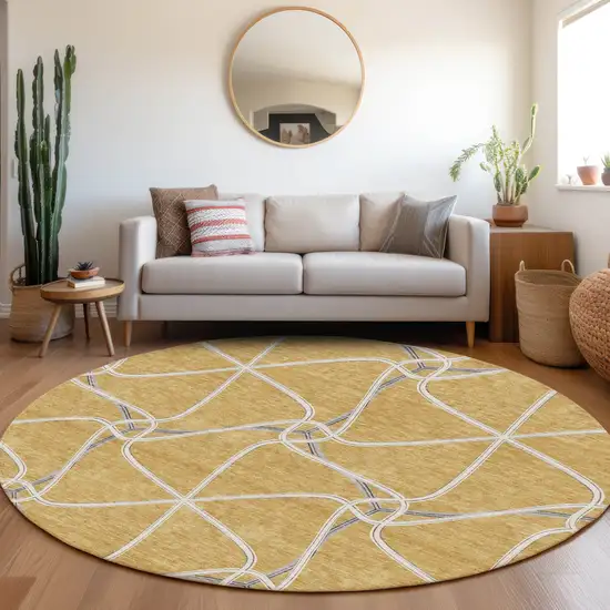 8' Gold Ivory And Gray Geometric Washable Round Rug With UV Protection Photo 4