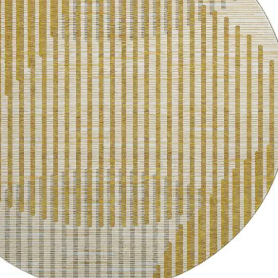 8' Gold Ivory And Gray Geometric Washable Round Rug With UV Protection Photo 2
