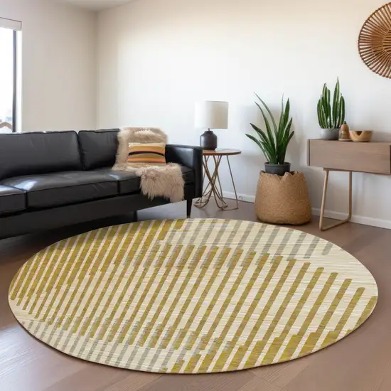 8' Gold Ivory And Gray Geometric Washable Round Rug With UV Protection Photo 4