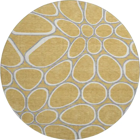 8' Gold Ivory And Gray Geometric Washable Round Rug With UV Protection Photo 1