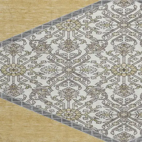 8' Gold Ivory And Gray Oriental Washable Round Rug With UV Protection Photo 2