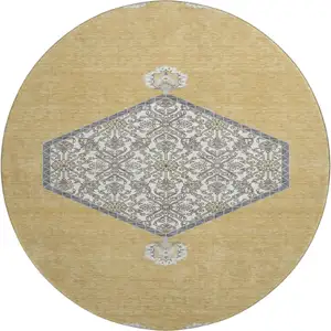 Photo of 8' Gold Ivory And Gray Oriental Washable Round Rug With UV Protection