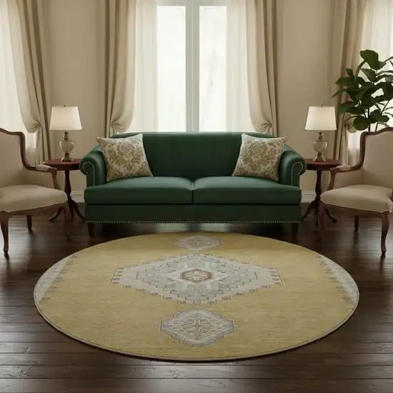 8' Gold Ivory And Gray Oriental Washable Round Rug With UV Protection Photo 2