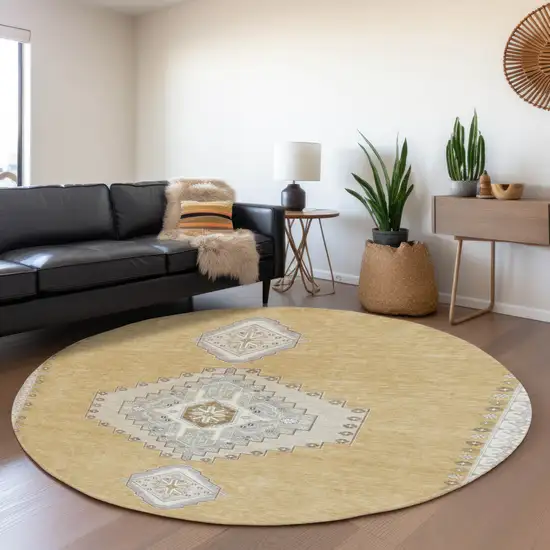 8' Gold Ivory And Gray Oriental Washable Round Rug With UV Protection Photo 4